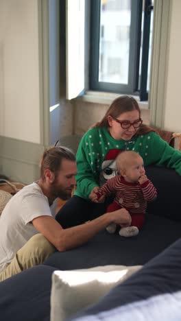 happy family with baby during christmas season