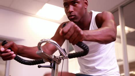 fit man working out on the exercise bike
