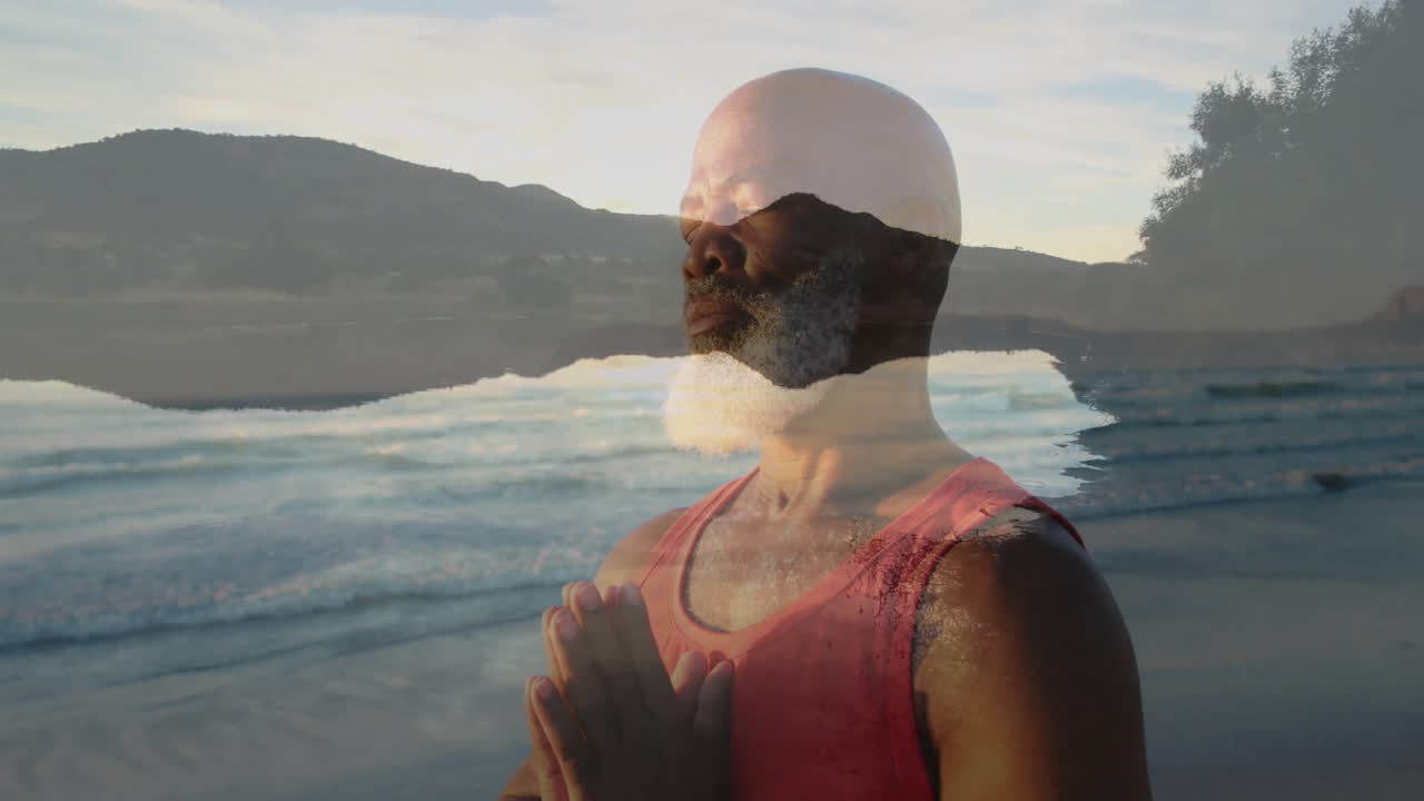 mature man meditating lakeside, featuring animated water waves and hill overlay for health design
