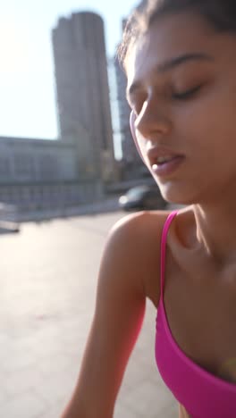 young woman working out outdoors