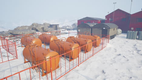 fuel tanks at a remote research station in the snow