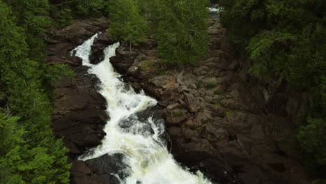 oxtongue river falls near algonquin provincial park - dolly aerial view