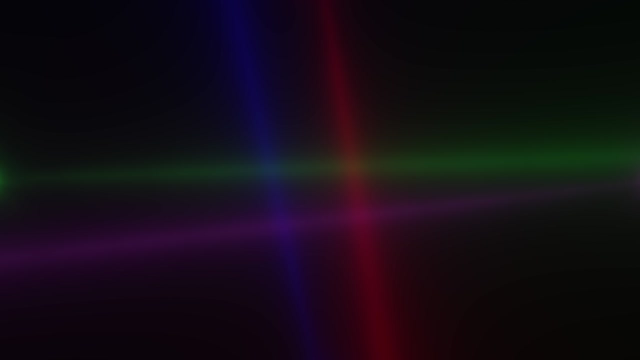 brillantes rayos de reflectores de colores en el escenario