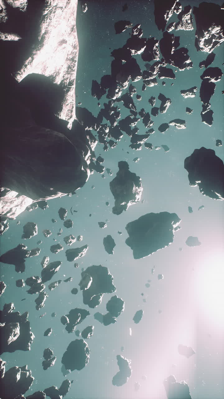 Flying through the asteroid belt in outer space vertical