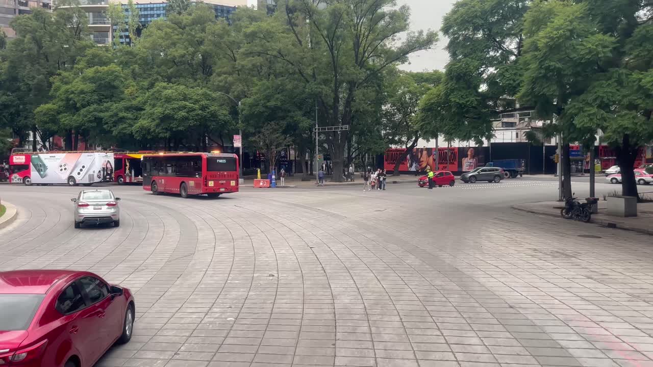 Mexico City Street Scene with Buses and Cars