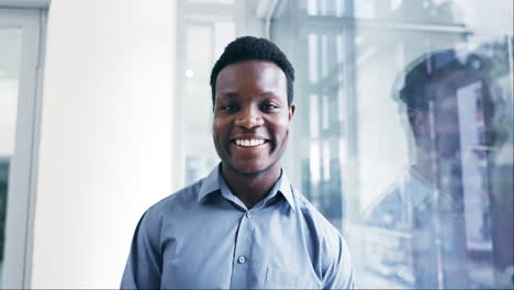 smile, face and a black man in an office