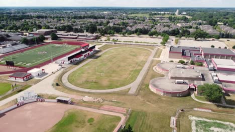 panning over a high school in the suburbs of detroit, michigan.