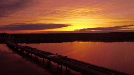 Aerial-sunset-over-bridge-under-construction