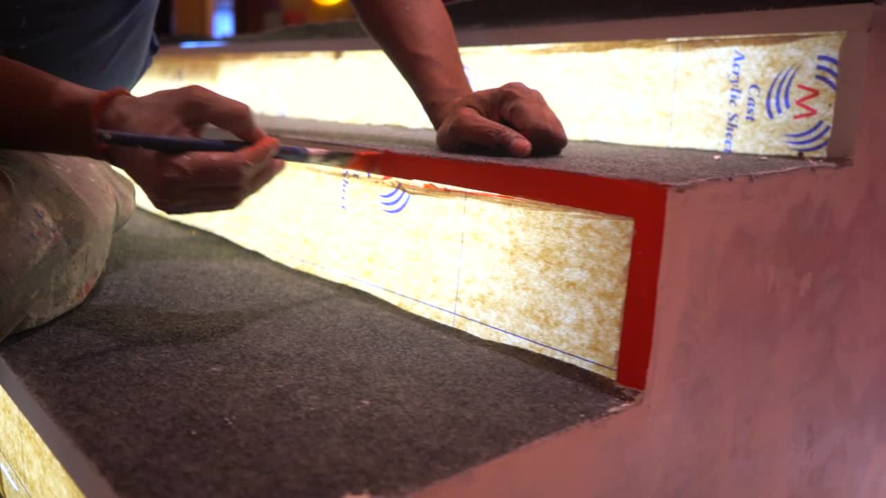 painter painting to stage closeup view