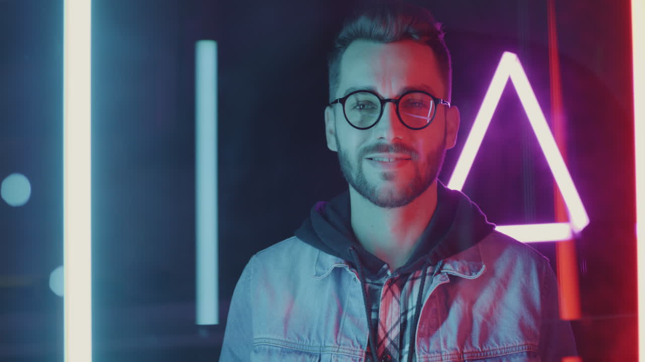 Man with Glasses in Neon Lights