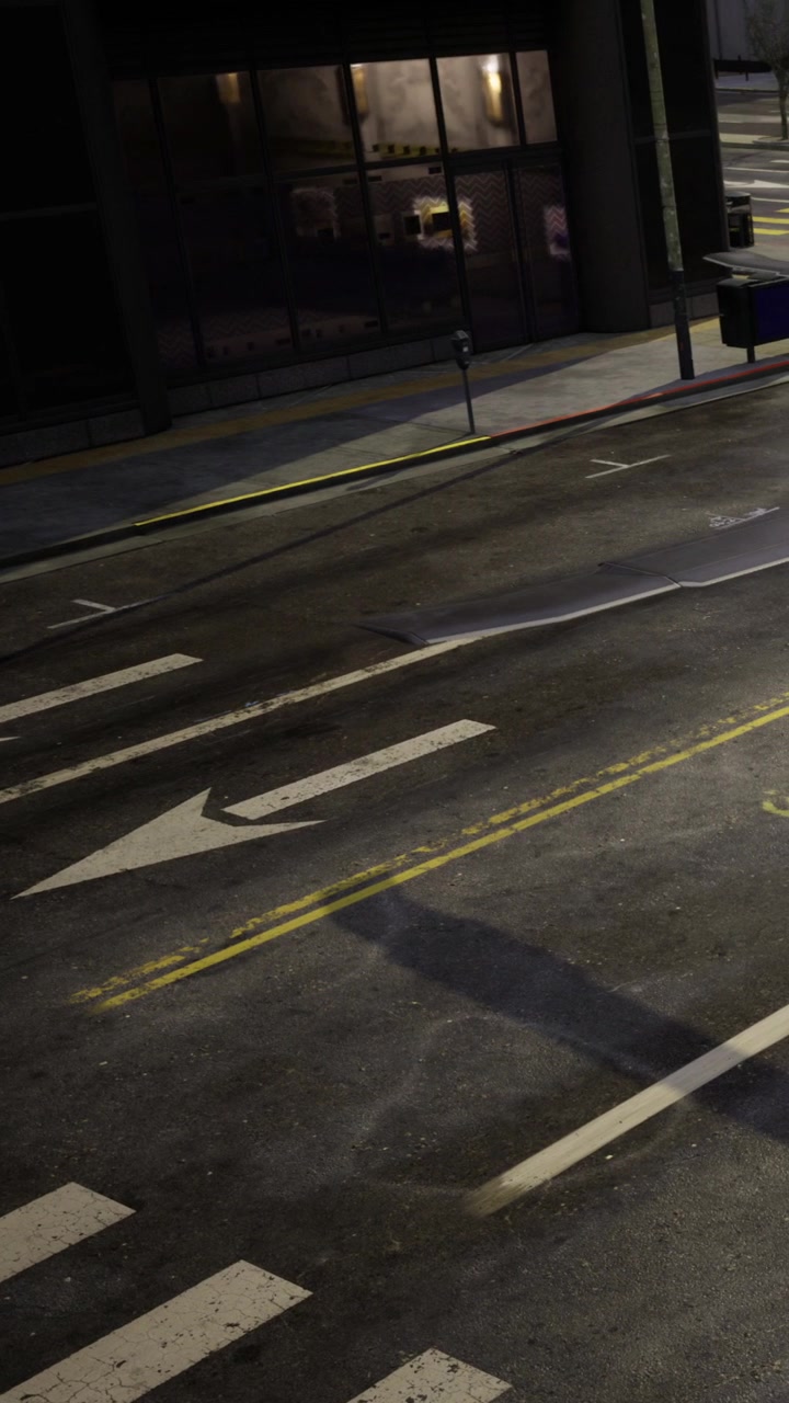Traffic signs and street details in a city at night