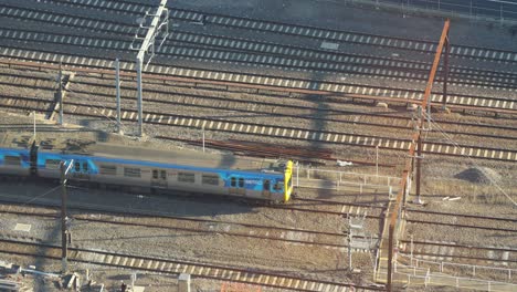 train moving along tracks in melbourne, australia