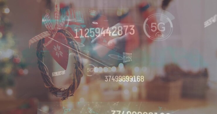 Animation of data processing on screens over christmas decoration
