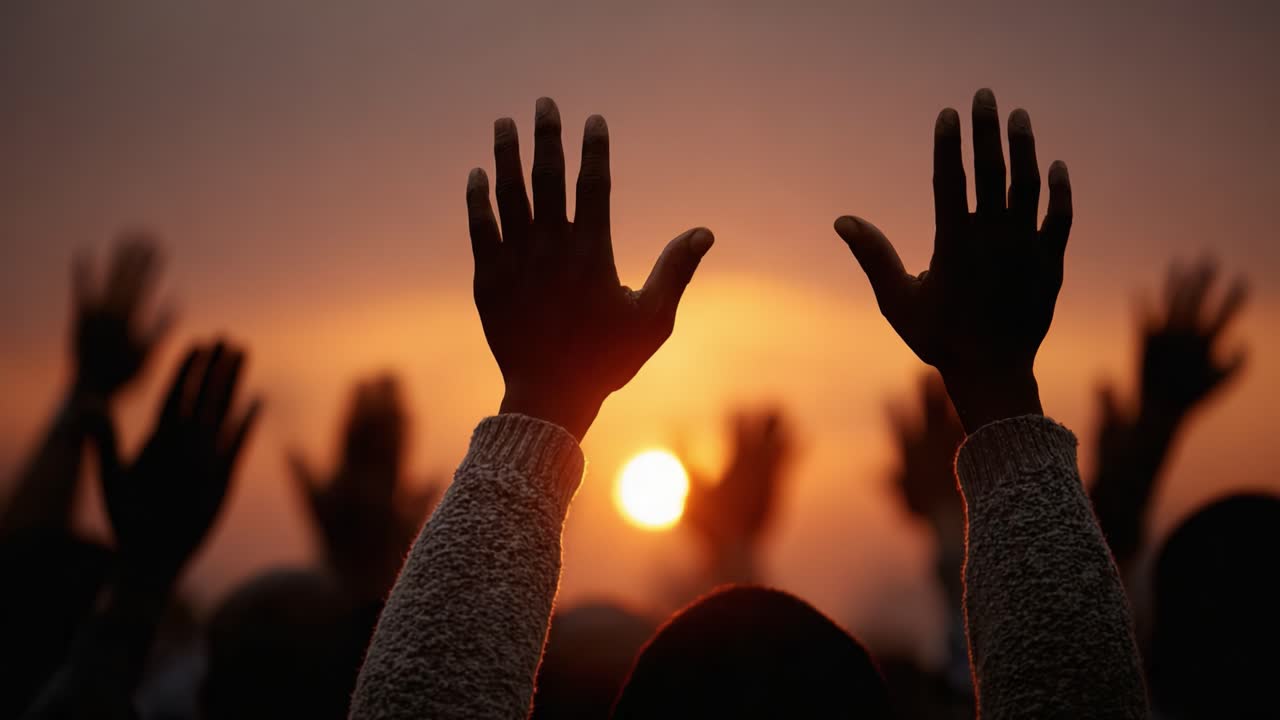 A Collective Gesture of Hope: People Reaching for the Sky as the Sun Sets, Symbolizing Unity and Aspiration in a Moment of Reflection and Togetherness