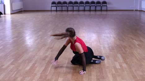 professional and passionate female dancer dances on the dance floor