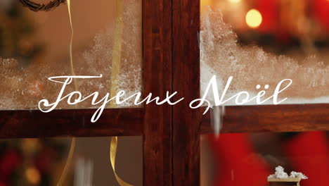 joyeux noã«l written over christmas decortations