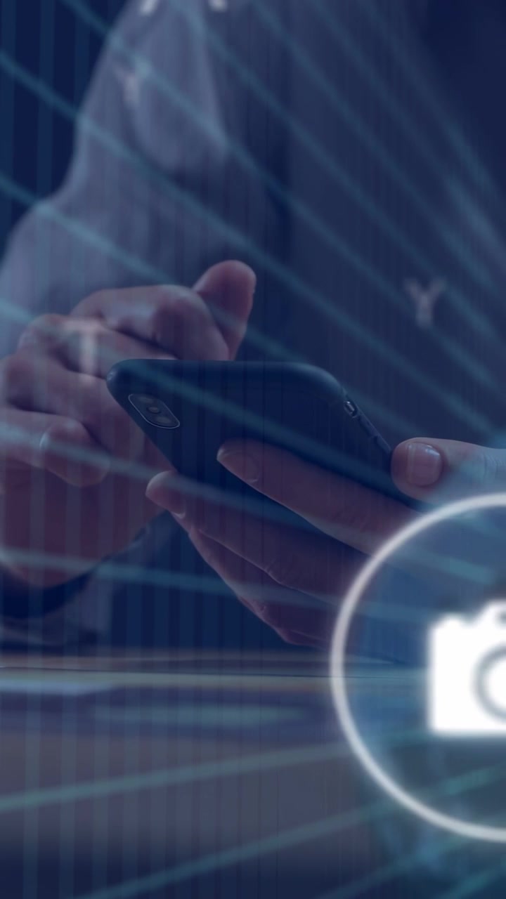 Vertical video: Man holding phone and right finger tapping, showing AR icons while browsing apps