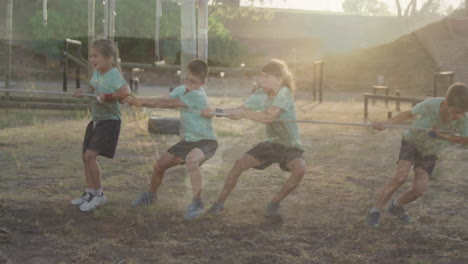 in school, children playing tug-of-war with animation of sunlight creating glow