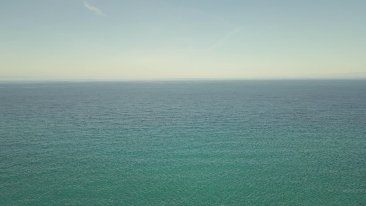 Witness the tranquil beauty of Cala Torta and Cala Mesquida in Majorca, with clear blue waters and peaceful horizons. Ideal for relaxation and nature appreciation.