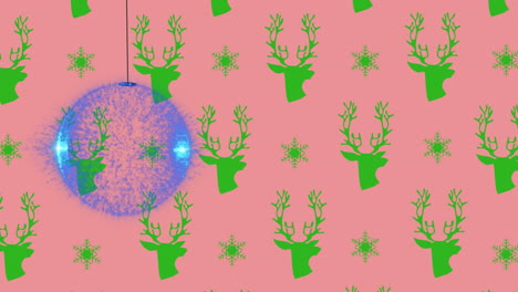 animation of christmas bauble over christmas reindeer pattern on pink background