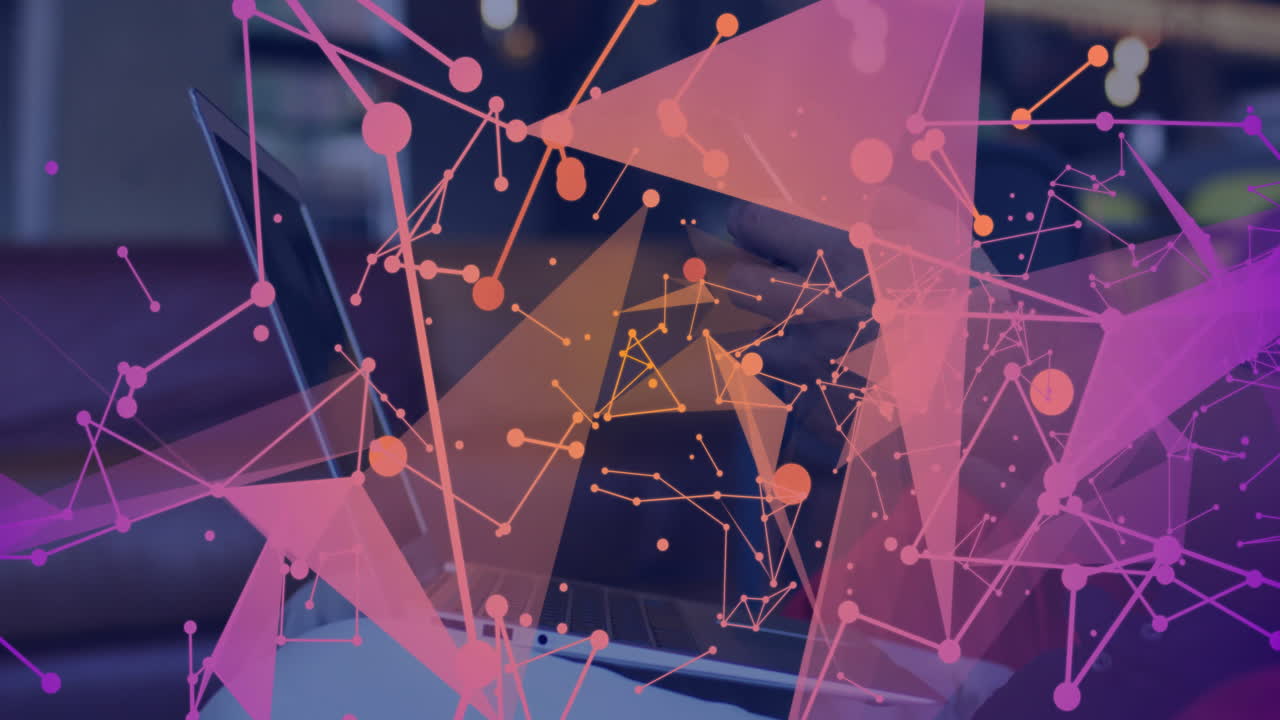 Using laptop, person surrounded by animation of abstract geometric shapes and network