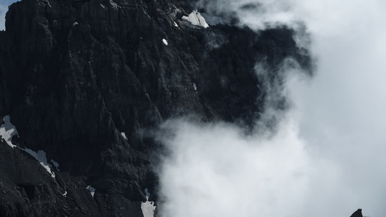 Mountain Peak Covered in Clouds