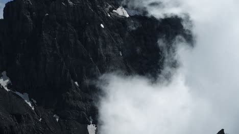 mountain peak covered in clouds