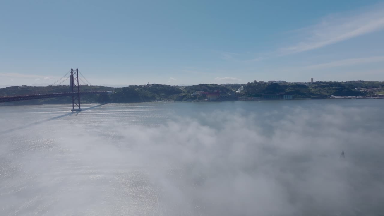 Drone shot of the fog over the river Tejo, in Lisbon.