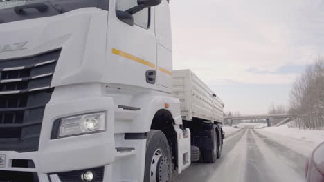 white truck on snowy road