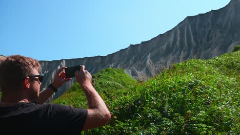 tourist photographs the unique cliffs