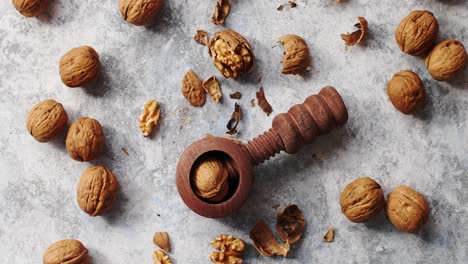 wooden cracker with walnuts in composition