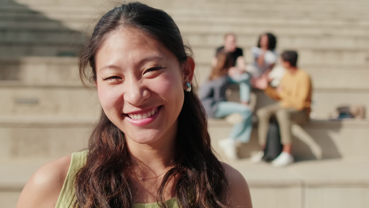 Close up of Asian girl with a notebook, cute girl in the school with her friends