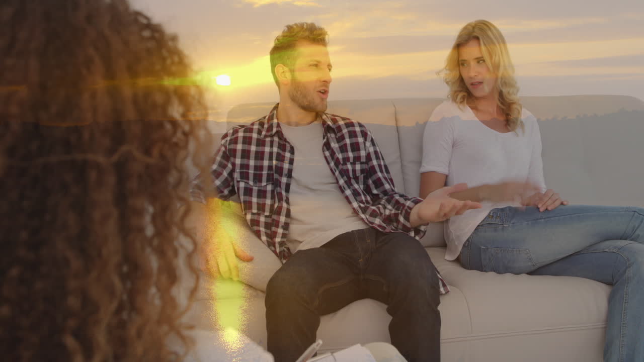 Animation of landscape over diverse people participating in couple therapy