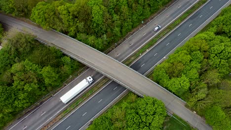 aerial view of cars and lorries passing under a bridge over the a2 dual carriage way in canterbury