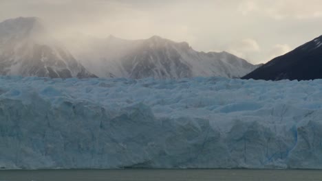 A-shot-looking-across-a-glacier-to-mountains-in-background