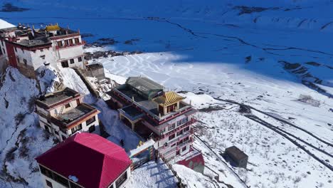 aerial view of a himalayan monastery in winter