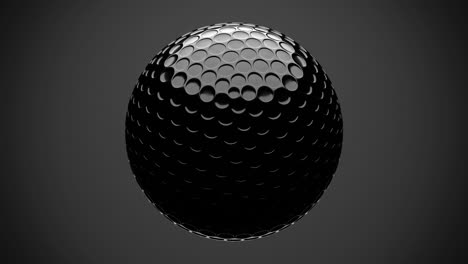 black golf ball isolated on gray background.