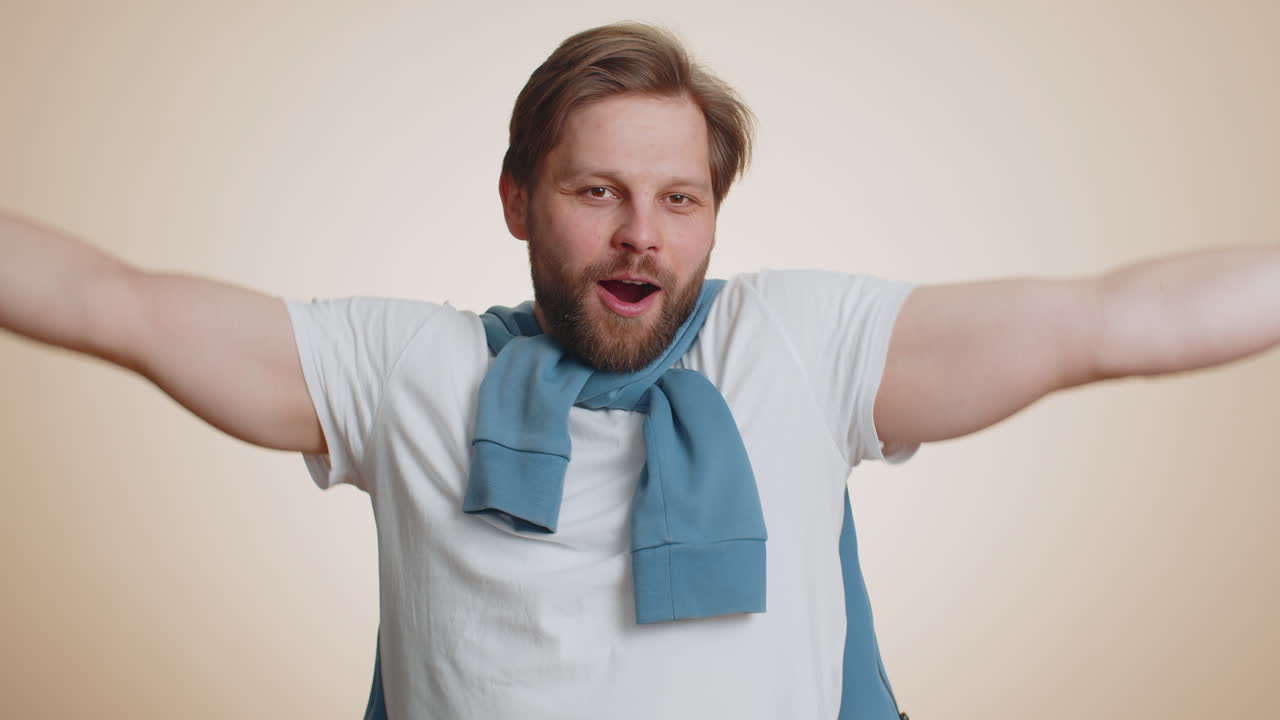 Young man yawning sleepy inattentive feeling somnolent lazy bored gaping suffering lack of sleep