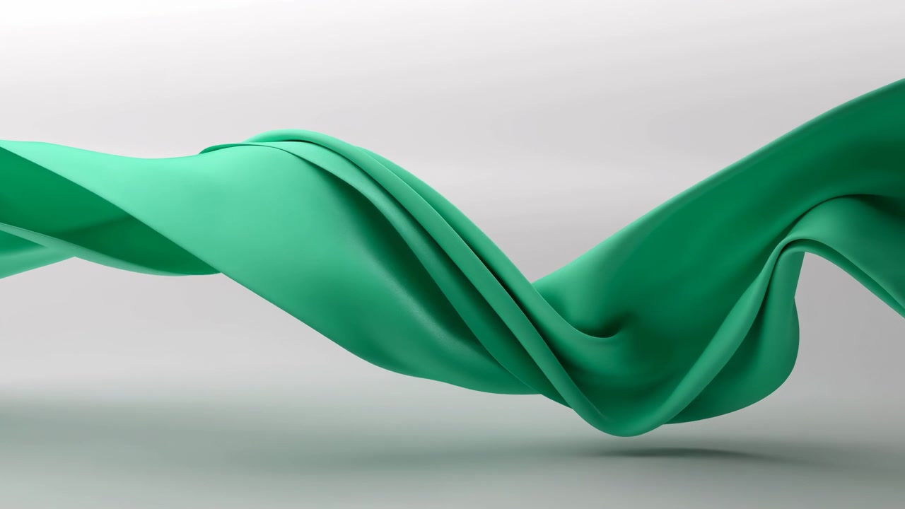 Abstract green fabric ribbon sweeps across a clean light gray background with soft folds, smooth curves, and elegant studio lighting