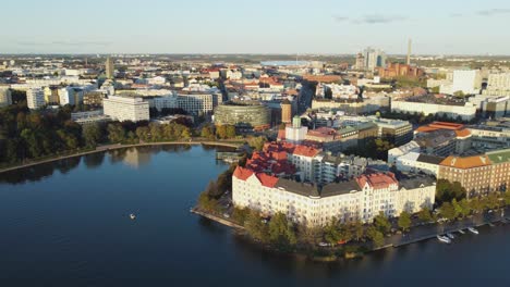 Evening-golden-hour-aerial-over-old-Europe-buildings-in-Helsinki,-FIN