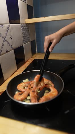 cooking shrimp in a pan