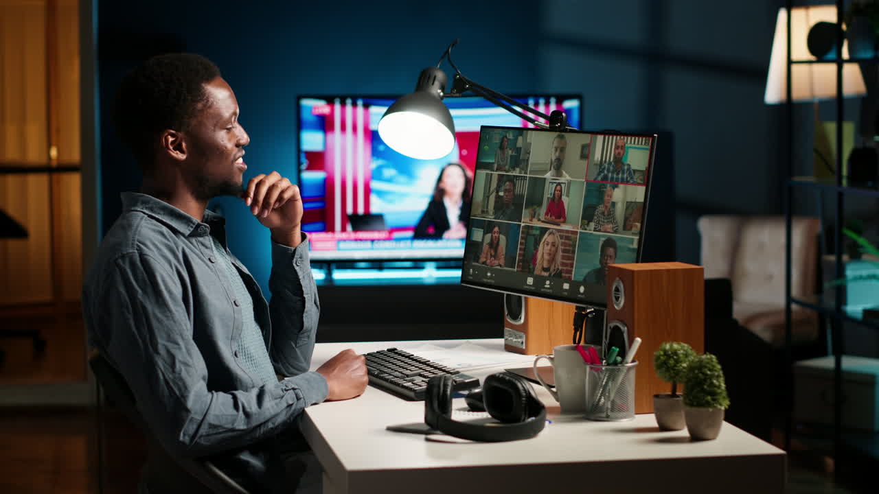 Black guy meeting with group of individuals on web video conference