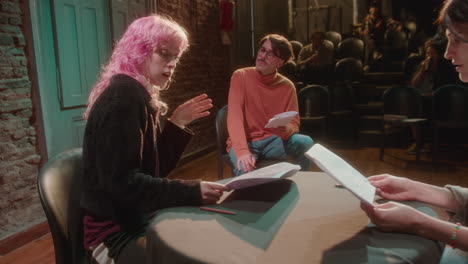 two young actresses having rehearsal with theater director