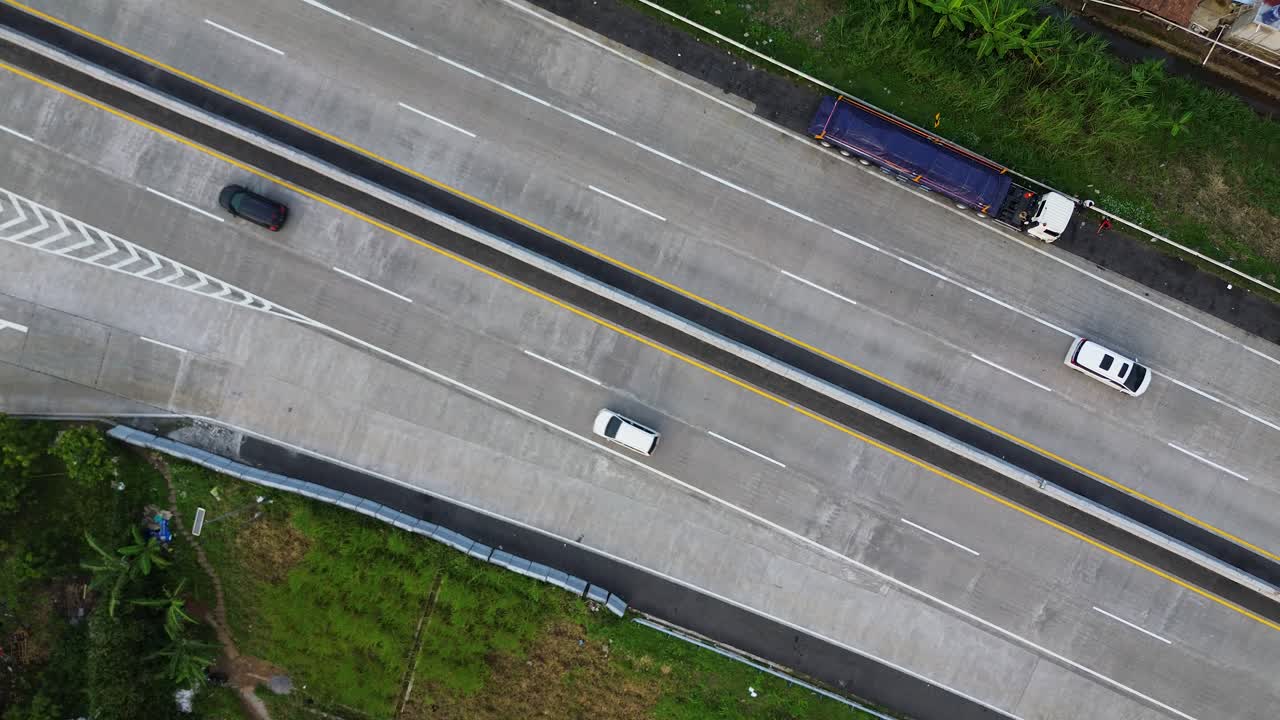 Beautiful Scenery Aerial Drone Busy Highway Road with Colorful Cars and Freight Logistics Trucks