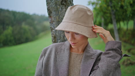 woman in a rain hat