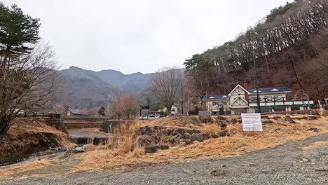 japanese village landscape with mountains and river