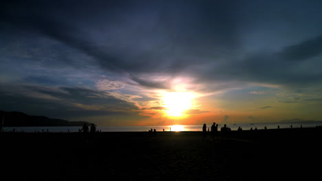 time lapse of the people walking around on the beach in da nang.