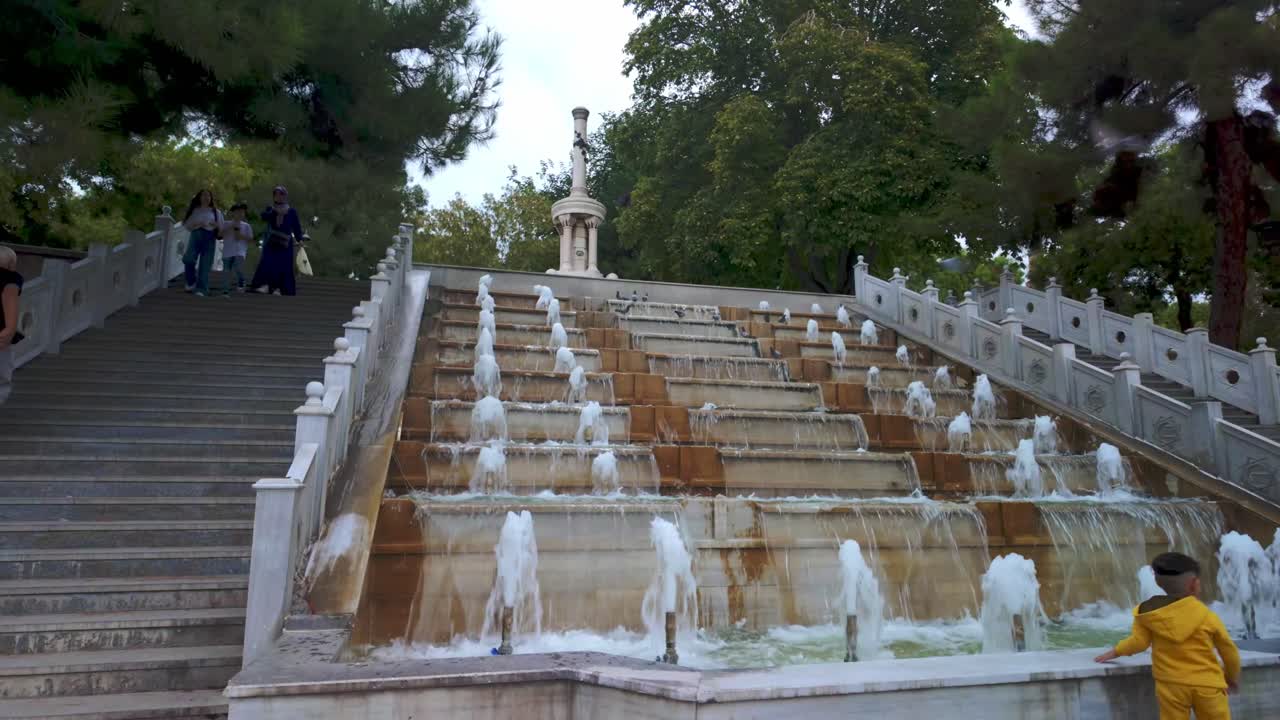 Elegant stairs and fountain in a Konya park, adding beauty and character to this peaceful Turkish green space