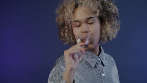Woman Celebrating with Champagne