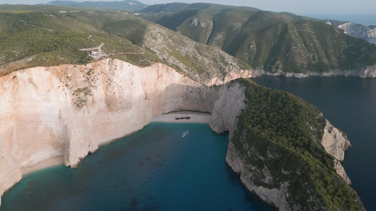 Navagio beach, zante, showing cliffs and turquoise waters, aerial view